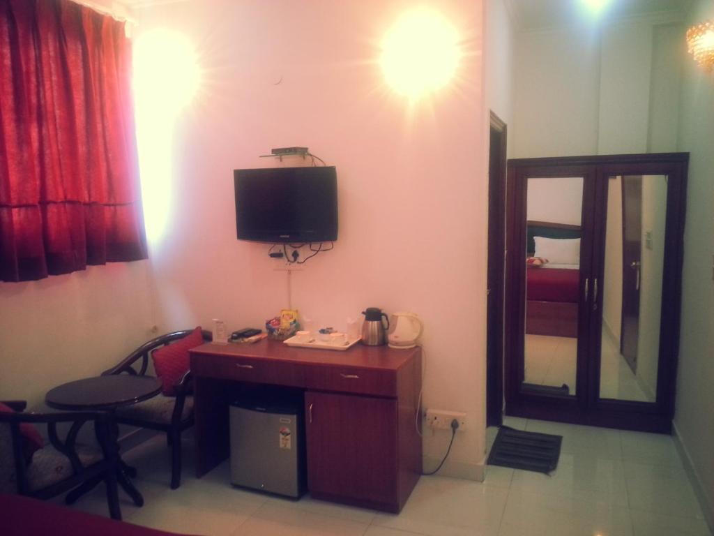 Hotel Malik Continental Нью-Дели Номер фото